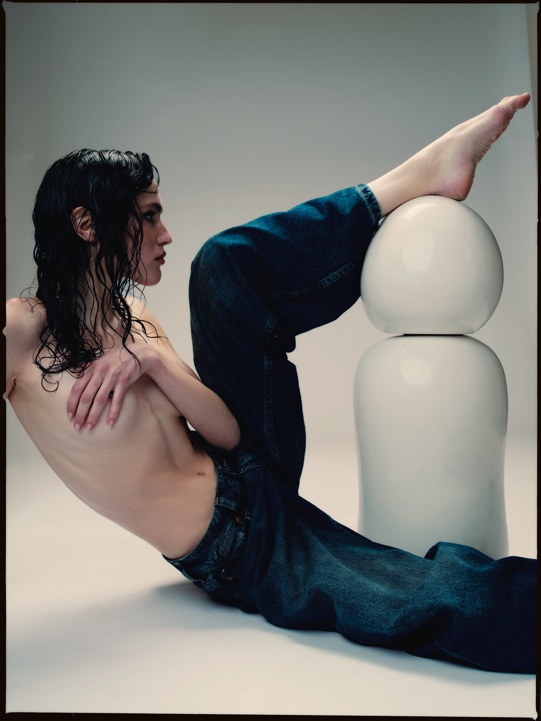 Model in denim beside a large Opal lubricant bottle for Ples'Jour.
