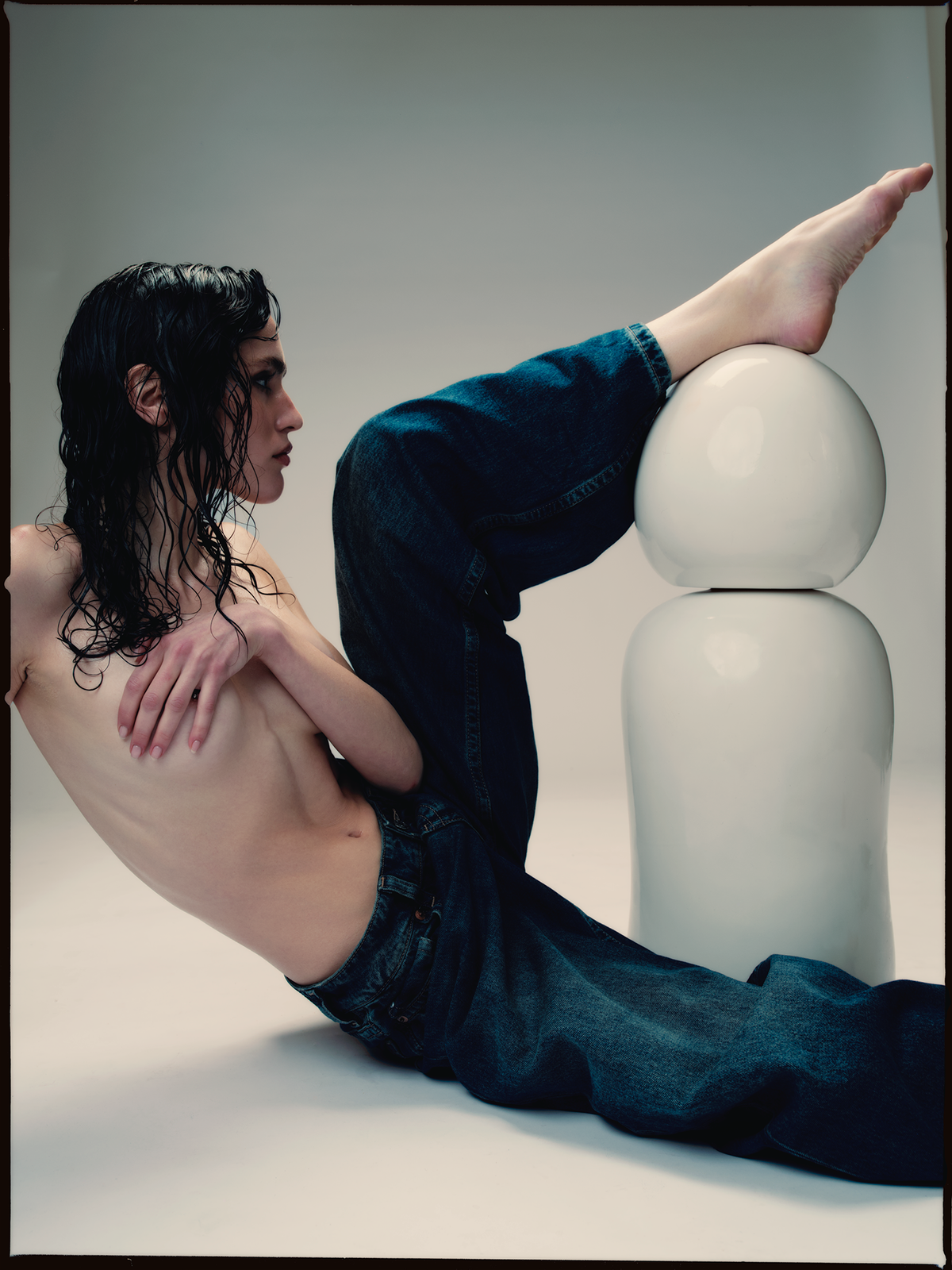 Model in denim beside a large Opal lubricant bottle for Ples'Jour.